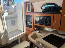 Load image into Gallery viewer, 2006 Wellcraft 290 Coastal walk around cuddy fish boat